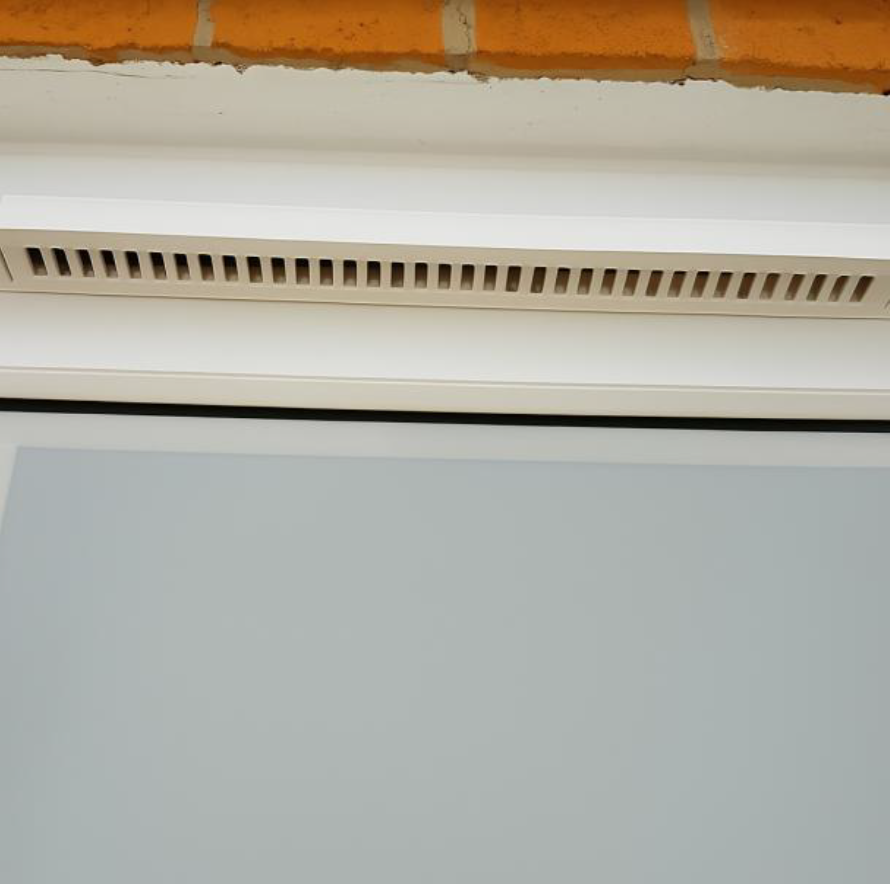Trickle vent at top of window frame