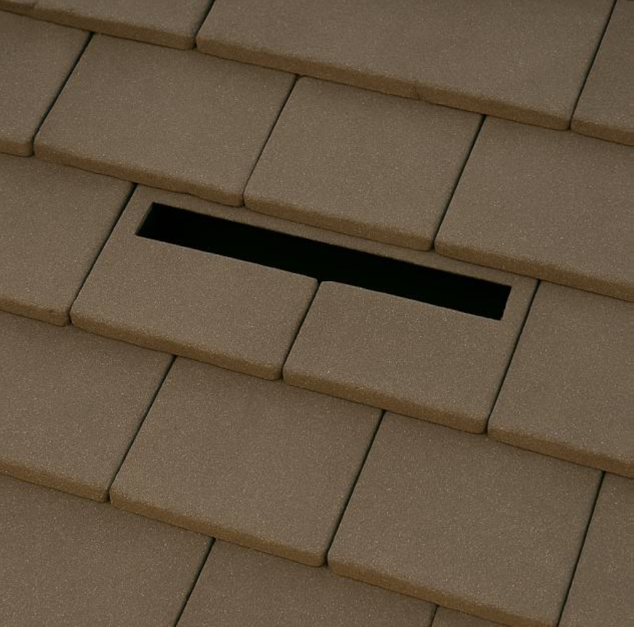 Vent tile on pitched roof